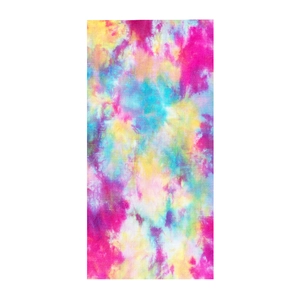 Detail view of microfiber beach towel fabric with vibrant multi-color tie-dye pattern