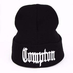 Black knit beanie with white Compton 3D embroidery and fold-over cuff for winter style
