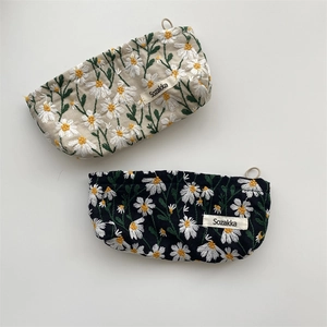 Floral daisy embroidery cosmetic bags in black and beige canvas, minimalist storage pouches
