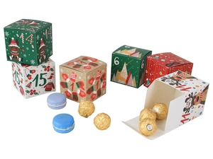 Detailed view of square cardboard Christmas advent calendar boxes with numbered patterns