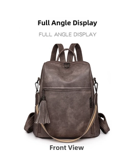 Front view of a dark brown faux leather backpack with metallic zippers and tassel decor