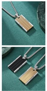 Detail view of rectangular pendant necklace with brushed steel and dual-tone finish