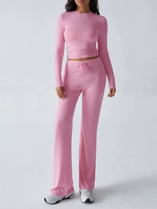 Detailed view of the pink long-sleeve slim top and drawstring wide-leg pants two-piece set