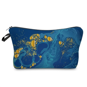 Portable luxury blue marble print makeup bag with gold foil accents and black zipper top