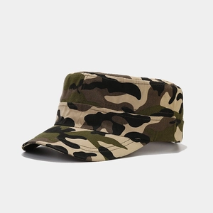 Detail view of the camouflage military cap showing its flat top and durable canvas texture