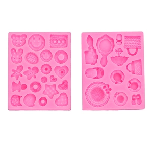 Mini silicone molds featuring bear rabbit heart and mirror shapes for chocolate or resin