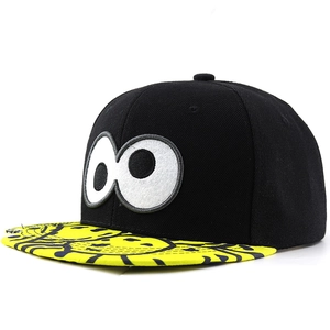 Snapback hip hop hat featuring cartoon eyes embroidery and yellow printed flat brim