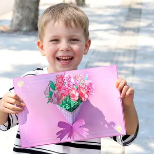 3D pop-up Mother's Day card with carnation bouquet held by a child in outdoor setting