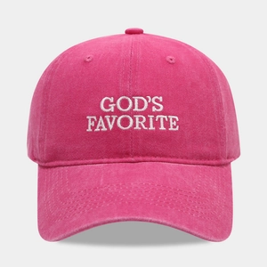 Macro detail of God's Favorite embroidery on a rose pink washed cotton baseball cap