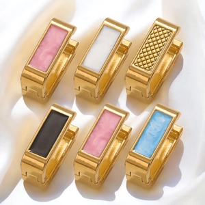 U-shaped gold stainless steel earrings set with colorful marble and textured inlays