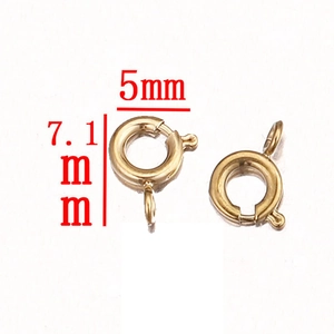 Macro shot of 7.1mm golden stainless steel spring ring clasp for jewelry making