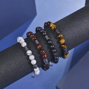 8mm tiger eye and hematite beaded bracelets with stainless steel spacers on display
