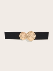 Detail of wide elastic waist belt with textured gold double round metal buckle