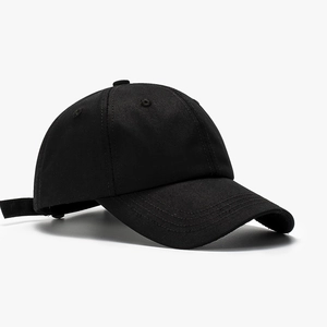 Classic minimalist black cotton baseball cap with adjustable strap for men and women