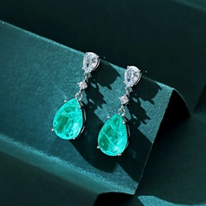 Elegant 925 sterling silver drop earrings with emerald cut green gemstones and white zircon