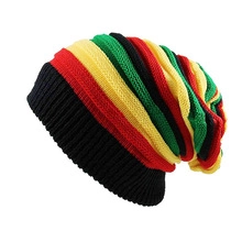 Close-up of the colorful striped knitting texture on the loose Christmas beanie hat