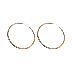 Minimalist gold metal hoop earrings for women with a sleek polished finish on white background