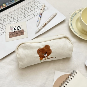 Cute beige canvas pencil case with bear embroidery and smile lettering for students