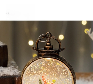 Close-up of vintage Christmas lantern with Santa gnome and swirling gold glitter