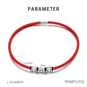 Detailed view of red braided cowhide cord with silver metal beads and black rubber rings