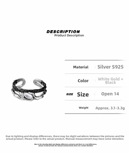 Detail of S925 sterling silver ring with black texture and marquise cut zircon