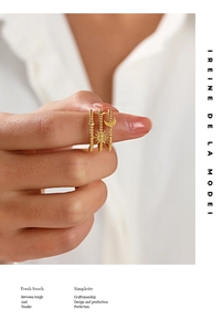 Three-piece gold stainless steel celestial ring set with sun moon and star motifs