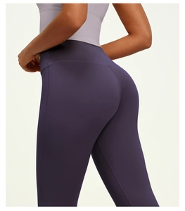 Close-up detail of high-waist lifting seam and breathable matte fabric on yoga leggings