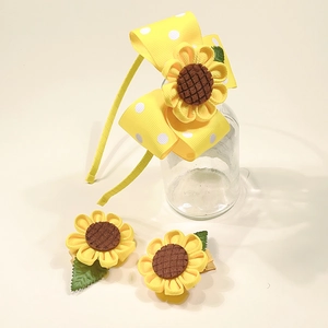 Detailed set of yellow polka dot sunflower hair clips and headband for girls