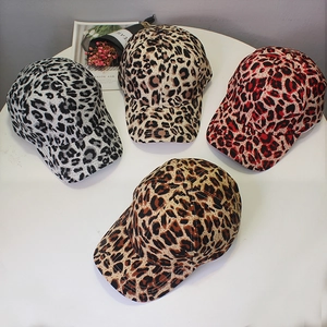 Curved brim leopard print baseball caps shown in grey, beige, red, and dark brown colors