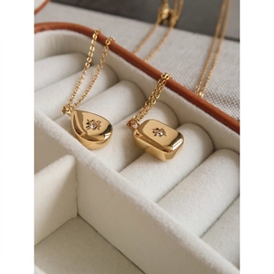 Minimalist 18K gold-plated stainless steel square and teardrop starburst pendant necklace
