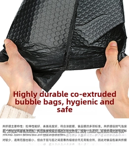 Close-up of black co-extruded film bubble mailer showing high tear resistance and durability