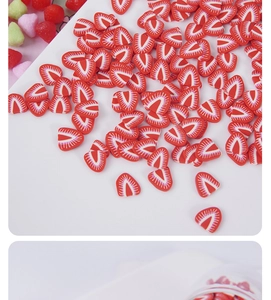 Macro detail of red and white polymer clay strawberry slices for DIY crafts and nail art