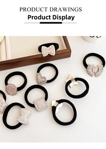 Detailed close-up of high elasticity hair ties set with rhinestones and pearls