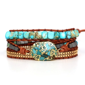 Bohemian multi-layer turquoise bead bracelet with gold accents and leather strap