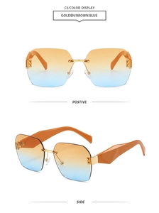 Detail of rimless square sunglasses with gold frame and brown-blue gradient lenses