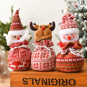 Set of 3 knitted Christmas gift bags with Santa, Reindeer and Snowman drawstring designs