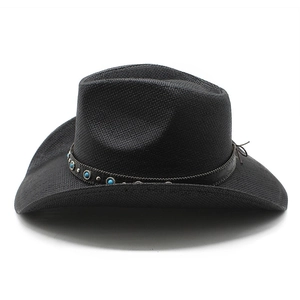 Detail of black woven cowboy hat featuring turquoise stone and silver stud hatband