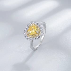 925 silver heart ring with double halo yellow heart-cut zircon on silk background