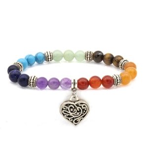 Detail of seven-color gemstone beaded bracelet with a hollow heart metal pendant