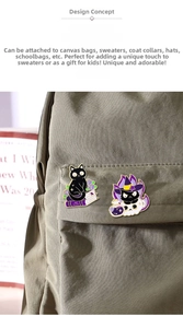 Detail of two black cat enamel pins on grey backpack featuring magic and book motifs