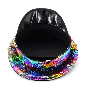 Top-down view of rainbow sequins and black patent leather brim on the captain hat