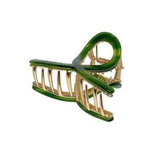 Elegant green acetate shark hair clip with golden metal gears for thick hair styling