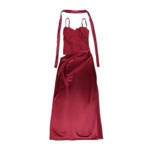 Flat lay of red French lace camisole top and satin slit maxi dress with ribbon tie