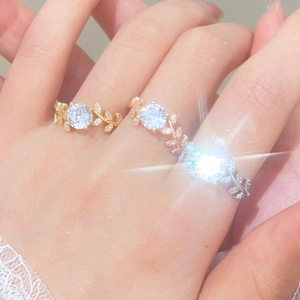 Laurel leaf branch rings in gold, rose gold and silver with round moissanite stones