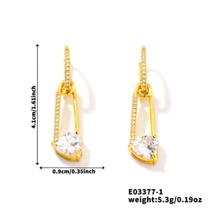 Golden safety pin earrings with heart zirconia, size 4.1cm by 0.9cm, weighing 5.3g