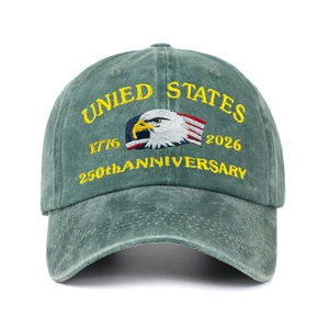 Close-up of the eagle embroidery and 250th Anniversary text on a green baseball cap