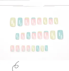 Detail view of 24pcs floral and macaron color block french press-on nails set