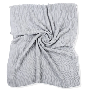 Gray rectangle pleated scarf with waffle texture in elegant spiral fold on white background