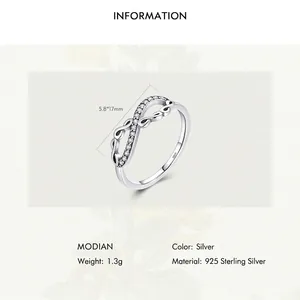 Polished S925 sterling silver infinity ring with sparkling pavé stones weighing 1.3g