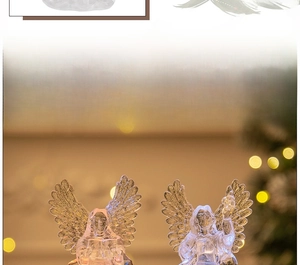 Detailed view of two crystal-like acrylic angels with intricate wing textures for decor